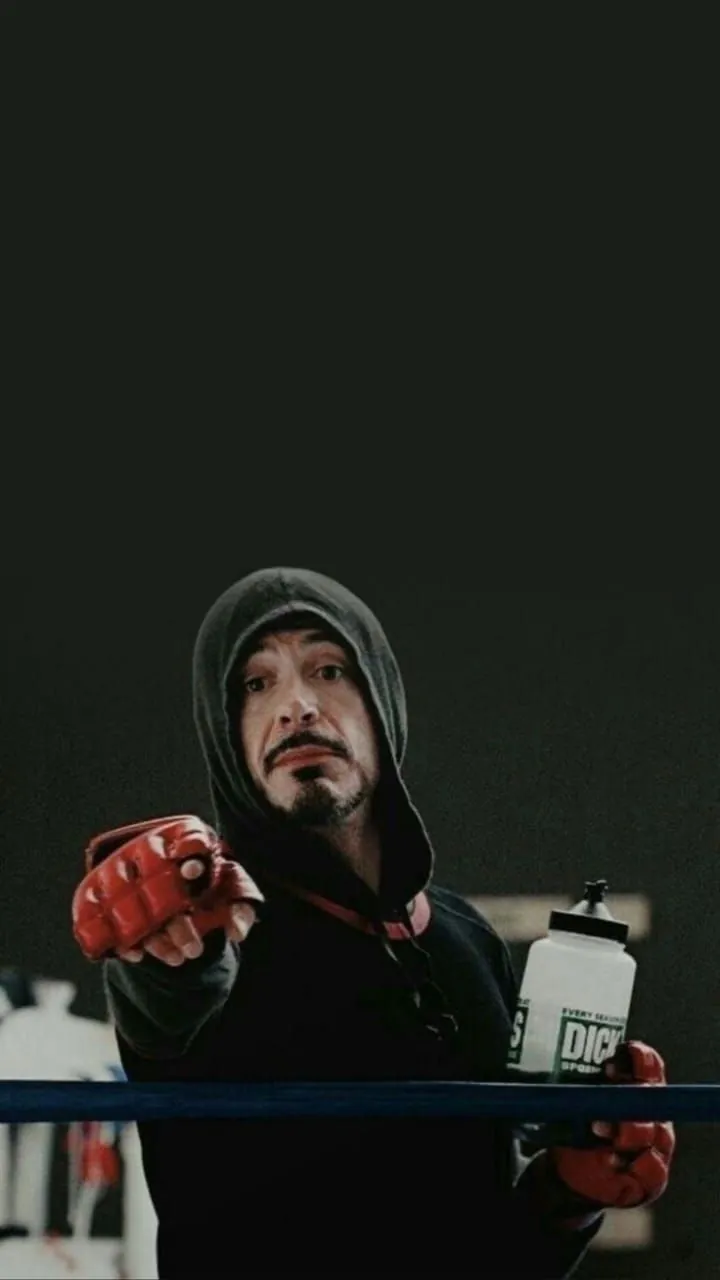 Tony Stark in workshop with arc reactor